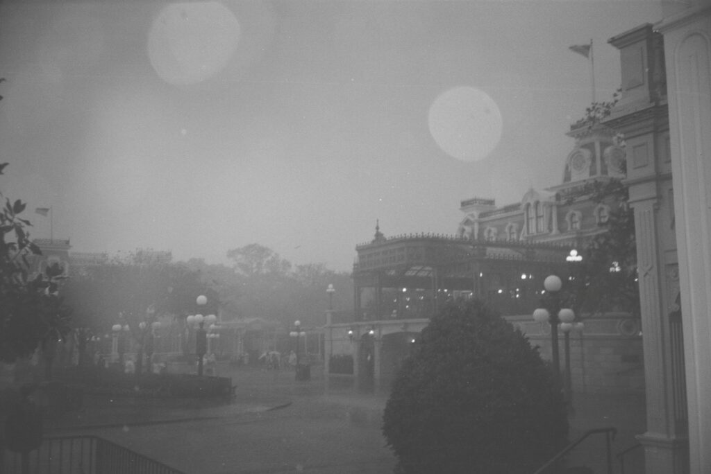 Buildings shrouded in fog.