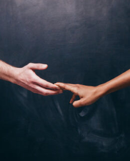 a couple holding hands, grasps slipping