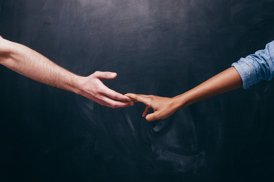 a couple holding hands, grasps slipping