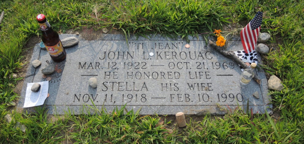 Gravestone of Jack Kerouac with items left by admirers