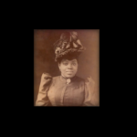 Formal photo of Sissieretta Jones with formal hat. Leader or The Black Patti Troubadours in late 1800s