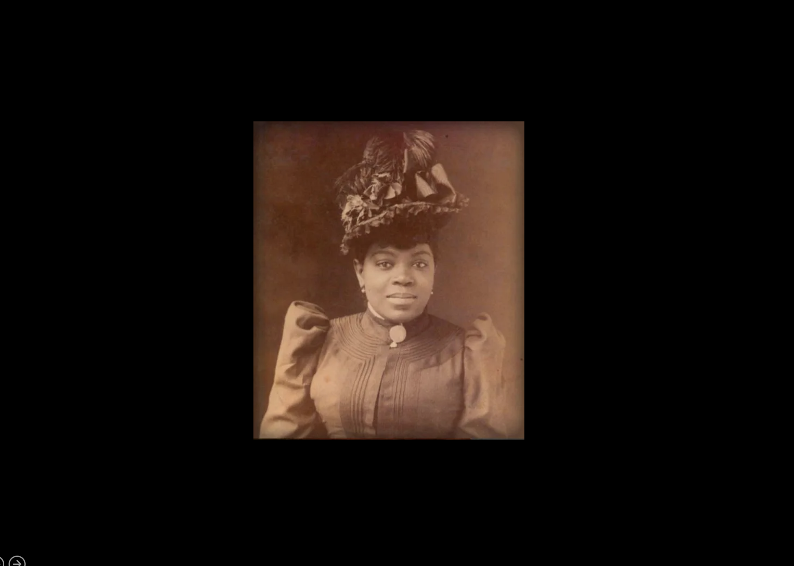 Formal photo of Sissieretta Jones with formal hat. Leader or The Black Patti Troubadours in late 1800s