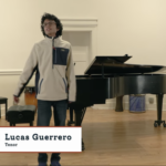 Singer in front of piano