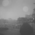 Buildings shrouded in fog.
