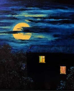 a house late at night with light coming from the windows