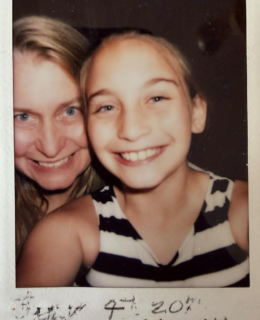 a polaroid of a mother and daughter